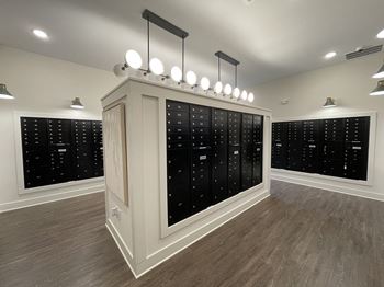 a wine room with a wall of wine racks and a large mirror